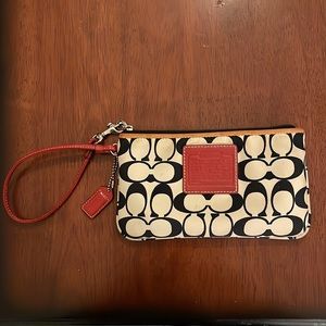 Black and white Coach wristlet